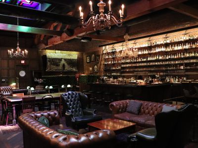 Warm up with whiskey and a fireplace at the <a href="https://everout.com/portland/locations/multnomah-whiskey-library/l20863/">Multnomah Whiskey Library</a>.