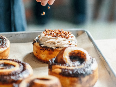 The latest addition to Micah Camden's restaurant empire is <a href="https://everout.com/portland/locations/kinnamons/l42532/">Kinnamons</a>, an elevated cinnamon roll bakery.