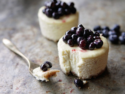 Treat yourself to <a href="https://everout.com/seattle/search/?q=macrina">Macrina Bakery</a>'s mini cheesecake topped with fresh blueberries.