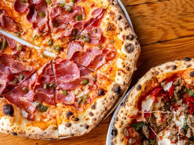 <a href="https://everout.com/portland/locations/kens-artisan-pizza/l24838/">Ken's Artisan Pizza</a> has officially been crowned one of the best 100 pizzerias in the world at a ceremony in Napoli this week.