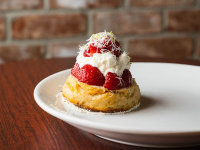 The recently opened Italian restaurant <a href="https://everout.com/portland/locations/scholar/l42892/">Scholar</a> updates the classic strawberry shortcake with sweet parmesan cream and a touch of lime sugar.