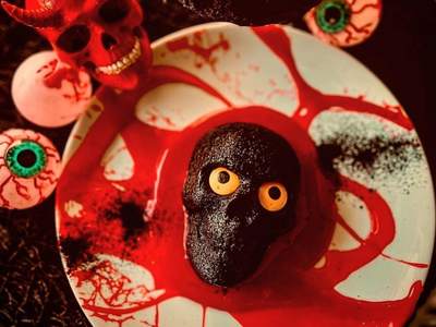Tuck into a black velvet skull oozing with passionfruit and white chocolate ganache at <a href="https://everout.com/portland/locations/hey-love/l19632/">Hey Love</a>'s <a href="https://everout.com/portland/events/black-lagoon-pop-up-bar/e130517/">Black Lagoon</a> pop-up.