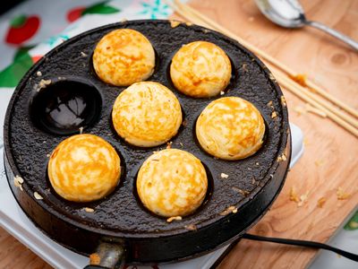 Enjoy some &aelig;bleskiver at the National Nordic Museum's <a href="https://everout.com/seattle/events/julefest-a-nordic-christmas-celebration/e130532/">Julefest</a>.