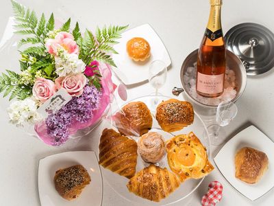 Honor your mom with fresh breakfast pastries and blossoms from <a href="https://everout.com/seattle/search/?q=petit%20pierre%20bakery">Petit Pierre Bakery</a>.