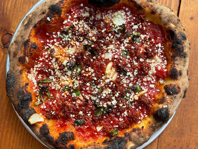 <a class="add-to-list-link add-to-list-link" href="https://everout.com/portland/locations/gracies-apizza/l41010/" data-model="attractions.location" data-oid="41010">Gracie's Apizza</a> is back in an expanded space in St. Johns.