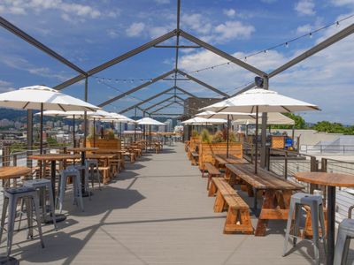 The time is finally ripe to lounge on a patio, like the one at <a class="add-to-list-link" href="https://everout.com/portland/locations/revolution-hall/l29375/" data-model="attractions.location" data-oid="29375">Revolution Hall</a>.