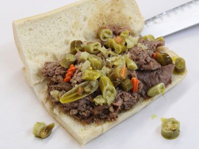 Sink your teeth into a juicy Italian beef, like this one from <a href="https://everout.com/seattle/locations/west-of-chicago-pizza-company/l41501/">West of Chicago Pizza Company</a>.