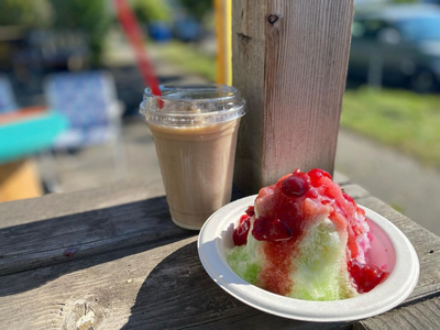 Cool off with a frosty treat from <a href="https://everout.com/seattle/locations/the-shorehouse-coffee-and-shaved-ice/l43771/">The Shorehouse Coffee and Shaved Ice</a> near Golden Gardens.