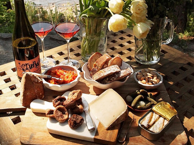 Acquire provisions for your girl dinner at <a href="https://www.thestranger.com/locations/44686/delaurenti-specialty-food-and-wine">DeLaurenti Specialty Food &amp; Wine</a>.