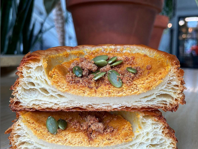 This pumpkin cheesecake croissant is just one of many autumnal treats on <a href="https://everout.com/seattle/locations/temple-pastries/l13815/">Temple Pastries</a>' fall menu.