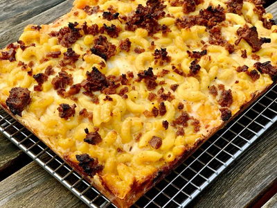 Believe it or not, this Detroit-style bacon mac and cheese pizza from <a href="https://everout.com/portland-mercury/locations/boxcar-pizza/l39786/">Boxcar Pizza</a> is 100% vegan.