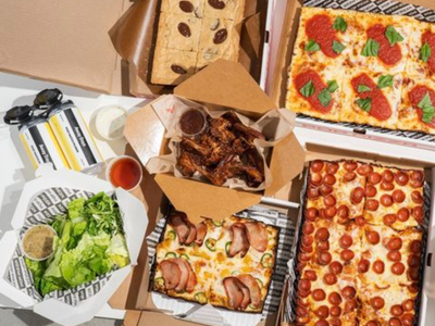 <a href="https://everout.com/portland-mercury/locations/pop-pizza/l39787/">Pop Pizza</a>'s deluxe Super Bowl combos include Detroit-style pizza, salads, cookie squares, and optional wings from <a href="https://everout.com/portland-mercury/locations/hat-yai/l20533/">Hat Yai</a>&nbsp;and beer from <a href="https://everout.portlandmercury.com/locations/away-days-brewing-co/l19299/">Away Days Brewing Co</a>.