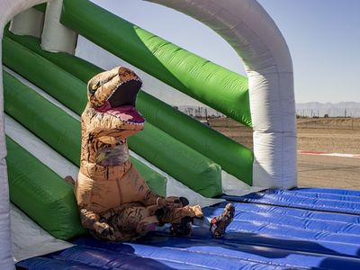 Let's hope this human in a dino suit makes an appearance at this Saturday's <a href="https://www.thestranger.com/events/40724384/the-great-inflatable-race">Great Inflatable Race</a>, a touring fun run punctuated by bouncy obstacles.