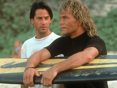 Just a couple of surfer bros in one of the best action movies of the past few decades, <i><a href="https://everout.thestranger.com/movies/point-break/A15566">Point Break</a></i>.