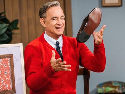 Tom Hanks as Mister Rogers slips into more comfortable footwear in <em><a href="https://everout.thestranger.com/movies/a-beautiful-day-in-the-neighborhood/A22797/">A Beautiful Day in the Neighborhood</a></em>.