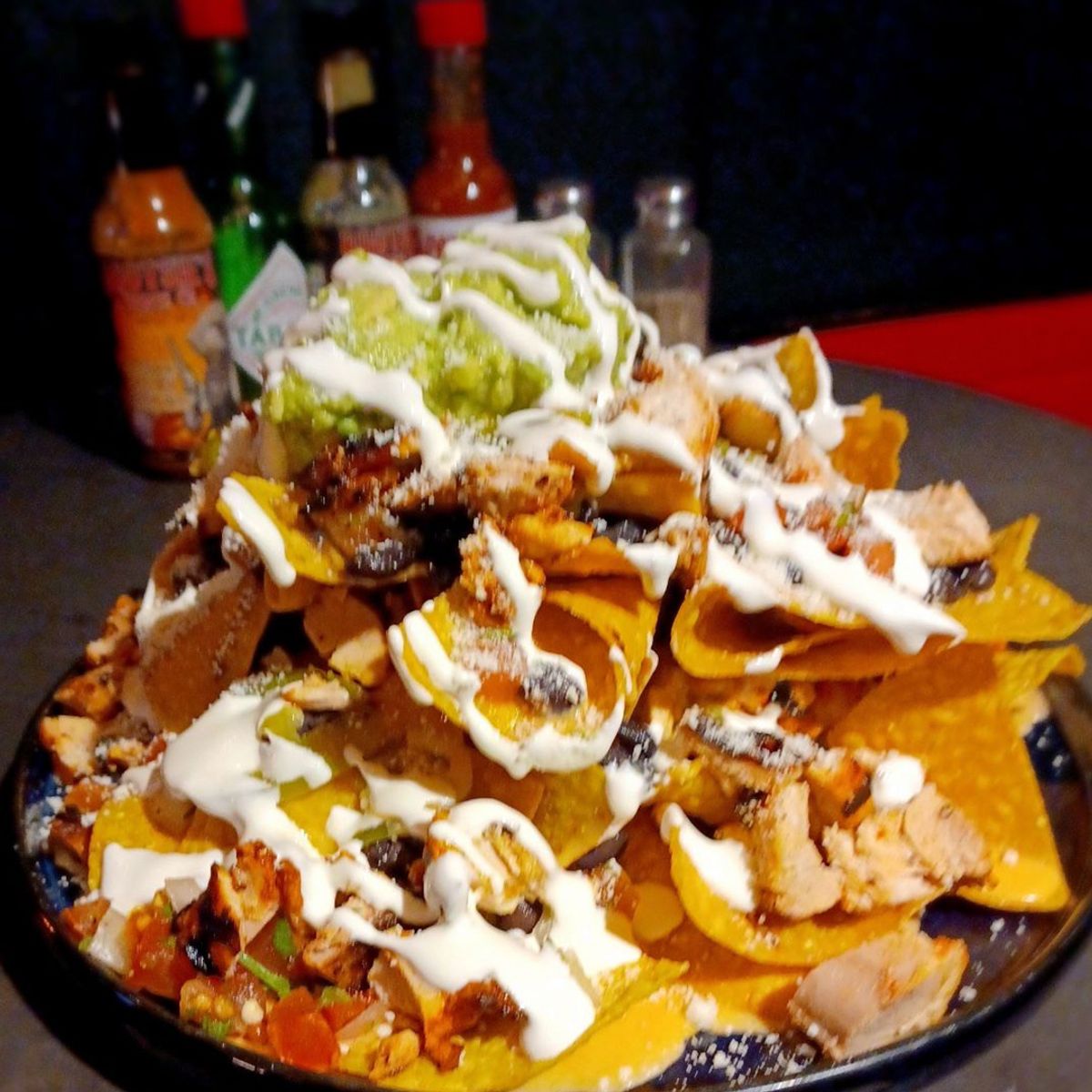 Grilled Ancho Chicken Nachos at Buho in Seattle, WA - Multiple dates ...