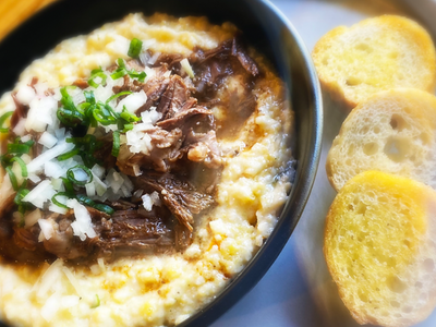 Birria over grits from <a href="https://everout.com/portland/search/?q=tamale%20boy">Tamale Boy</a>'s new sibling <a href="https://everout.com/portland/locations/colibri-by-tamale-boy/l44908/">Colibri</a>? Don't mind if we do.