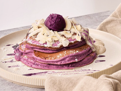 Dive into a stack of ube pancakes at <a href="https://everout.com/seattle/search/?q=coffeeholic%20house">Coffeeholic</a>'s new brunch spot <a href="https://everout.com/seattle/locations/m-cozy-fusion-cafe/l44914/">M Cozy Fusion Cafe</a>.