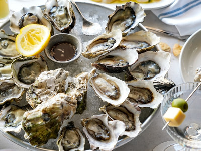 The downtown oyster bar <a class="add-to-list-link" href="https://everout.com/seattle/locations/ettas-big-mountain-bbq/l19982/" data-model="attractions.location" data-oid="19982">Half Shell</a> is the newest addition to Tom Douglas's empire.