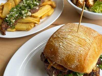 The newly opened <a href="https://everout.com/portland/locations/brunos/l45222/">Bruno's</a> purveys both steak frites and meaty sandwiches.