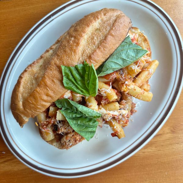 Paulie's baked ziti and burrata on garlic bread