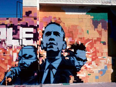 This photograph of a Los Angeles mural (featuring Martin Luther King, Jr., Barack Obama, and Malcom X) is part of the Smithsonian's touring <a href="https://www.thestranger.com/events/42009770/men-of-change-power-triumph-truth">Men of Change</a> exhibit, currently on view at the Washington State History Museum.
